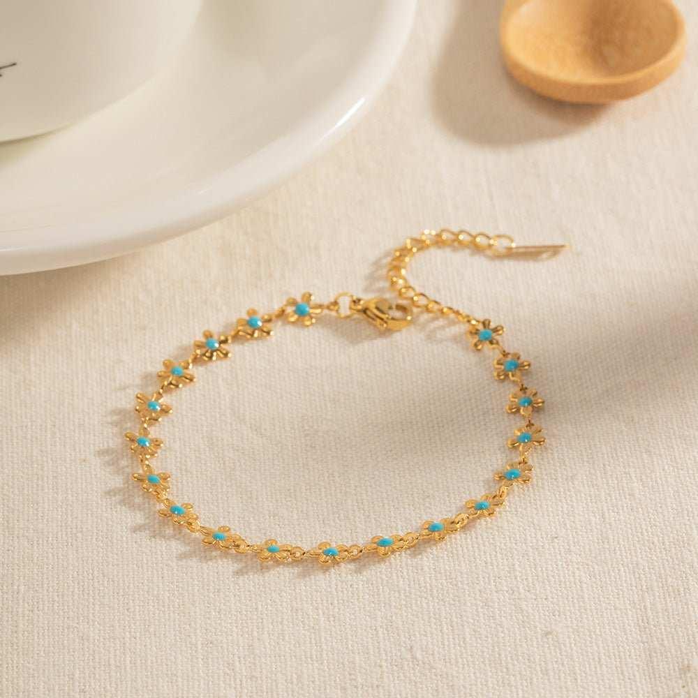 Add a touch of elegance to your outfit with our Glaze Flowers Necklace and Bracelet set. Made with delicate, handcrafted flowers, this set is perfect for any formal 