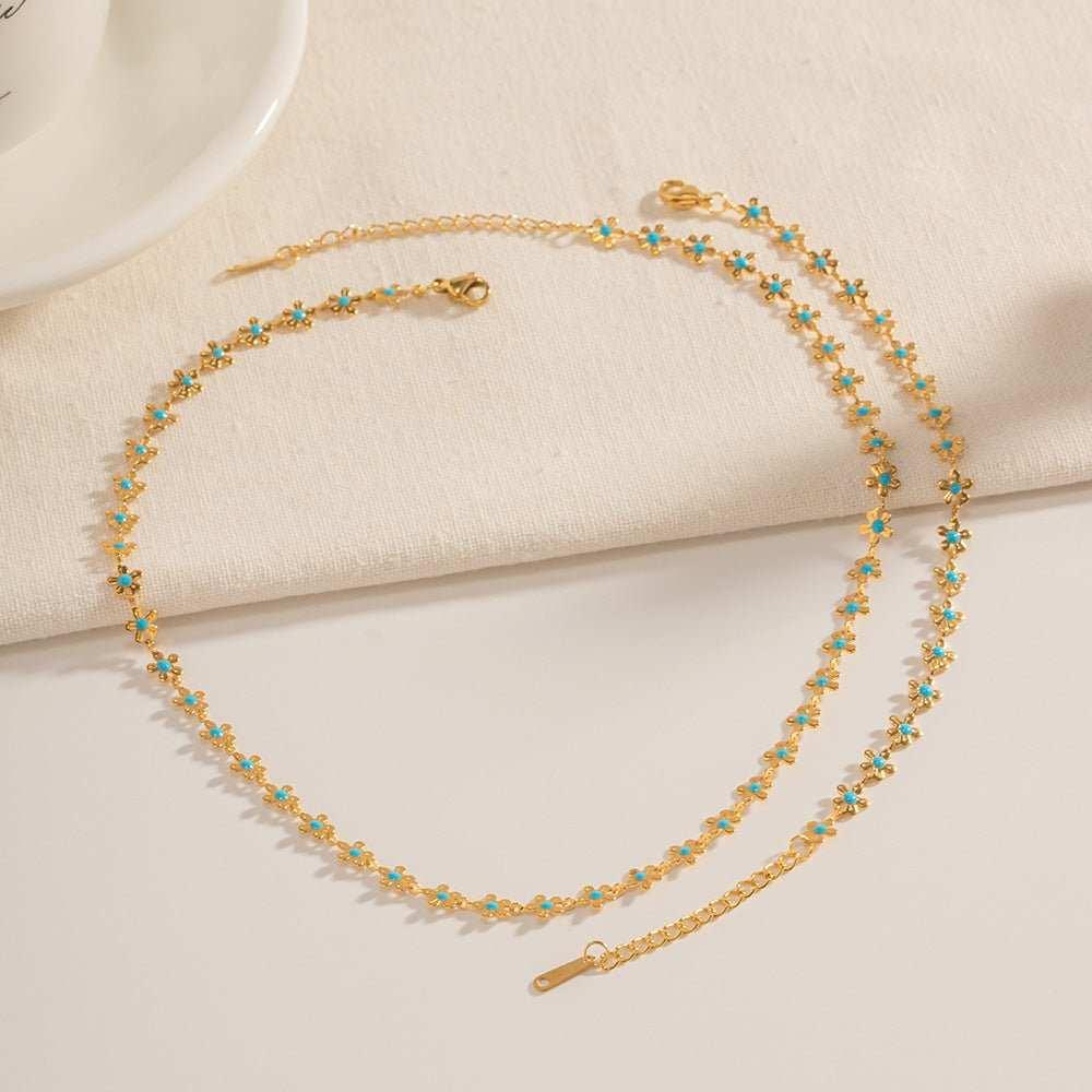 Add a touch of elegance to your outfit with our Glaze Flowers Necklace and Bracelet set. Made with delicate, handcrafted flowers, this set is perfect for any formal 