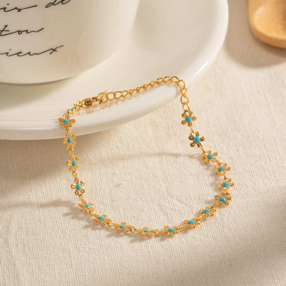 Add a touch of elegance to your outfit with our Glaze Flowers Necklace and Bracelet set. Made with delicate, handcrafted flowers, this set is perfect for any formal 