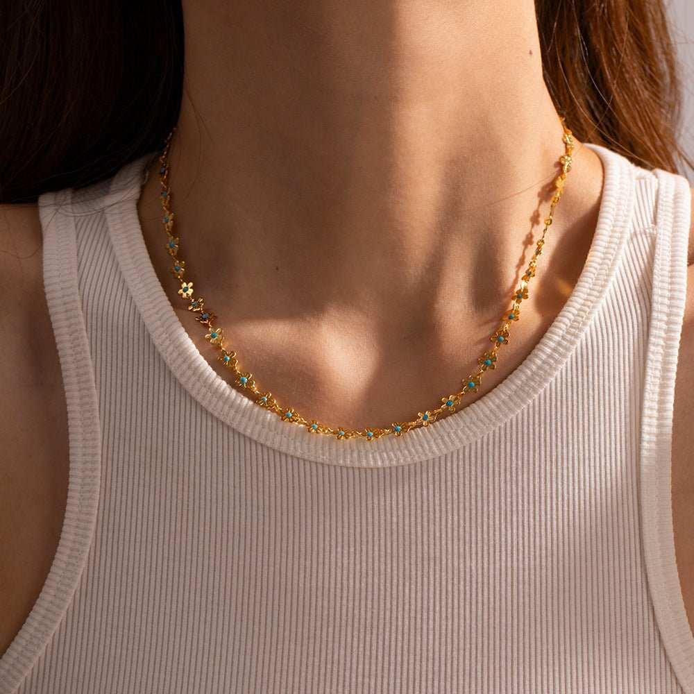 Add a touch of elegance to your outfit with our Glaze Flowers Necklace and Bracelet set. Made with delicate, handcrafted flowers, this set is perfect for any formal 