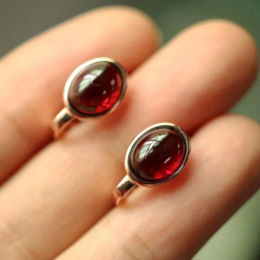 Oval natural Mozambique garnet silver earrings, 4.6 carats, rose gold plated.