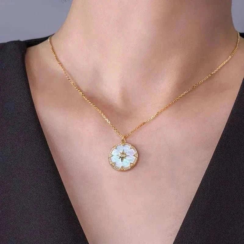 S925 Silver Octagon Star Compass Necklace with intricate star pendant on a gold chain.