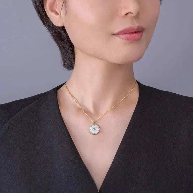 S925 Silver Octagon Star Compass Necklace worn by a woman, showcasing an elegant and stylish design.