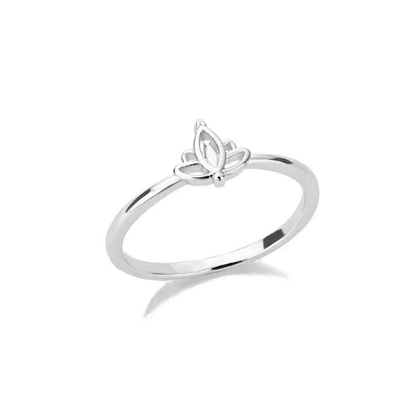 Experience timeless elegance with our Trend Vintage Lotus Rings. Crafted from durable stainless steel, this ring features a stunning lotus design that symbolizes bea