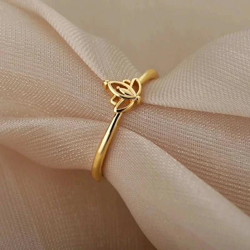 Experience timeless elegance with our Trend Vintage Lotus Rings. Crafted from durable stainless steel, this ring features a stunning lotus design that symbolizes bea