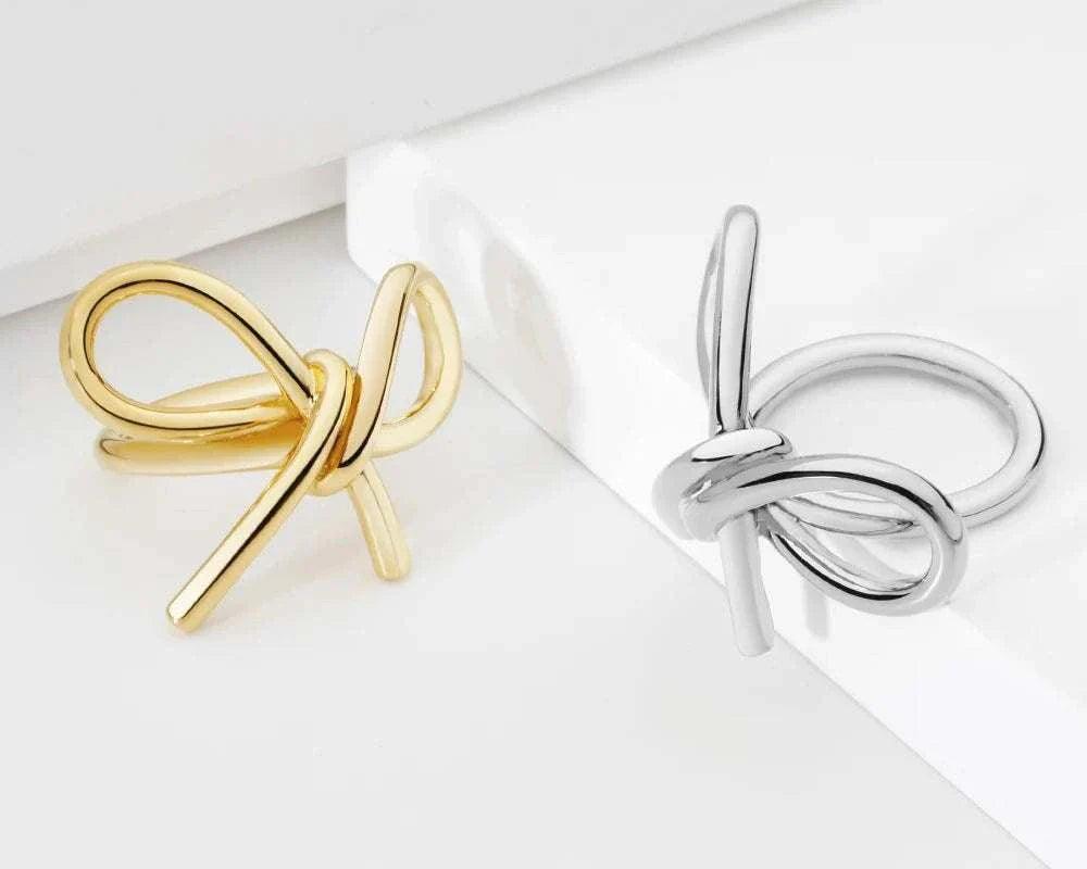 Add a touch of elegance to your style with our Elegant Bowknot of Lines Rings. These rings feature a delicate bowknot design, crafted with precision and attention to